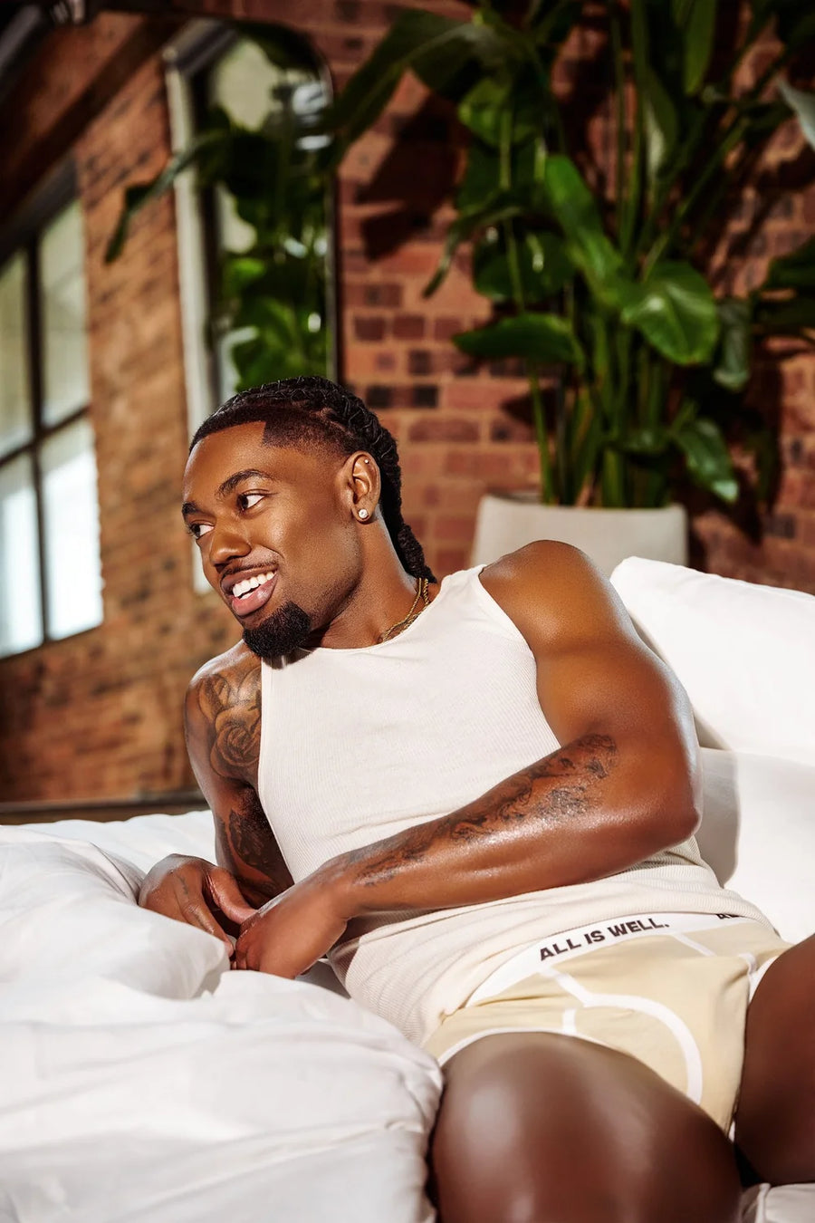 All Is Well Luxe Tank and Boxer Brief cream bed editorial